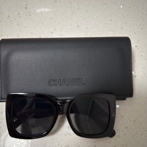 CHANEL Elegant Black Sunglasses with Case